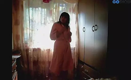Sexy Brunette Tantalizes in Bathrobe, Revealing Perky Breasts